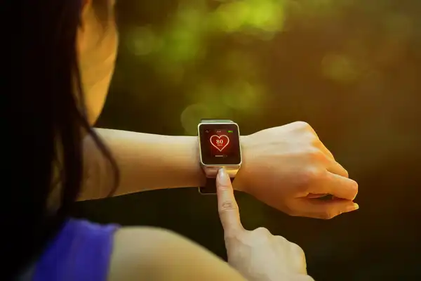 photo of heart rate monitor on jogger